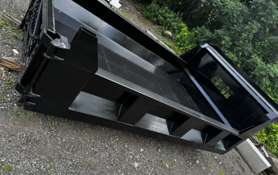 Fully custom fabricated 11’ long steel dump bed for a local mason /concrete contractor