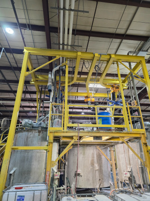custom designed and fabricated tank mezzanine Hoist Structure (18' 9' by 19') for a local Chemical Company
