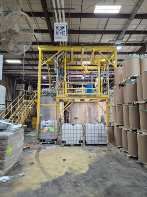 custom designed and fabricated tank mezzanine Hoist Structure (18' 9' by 19') for a local Chemical Company