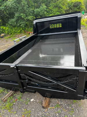 Fully custom fabricated 11’ long steel dump bed for a local mason /concrete contractor