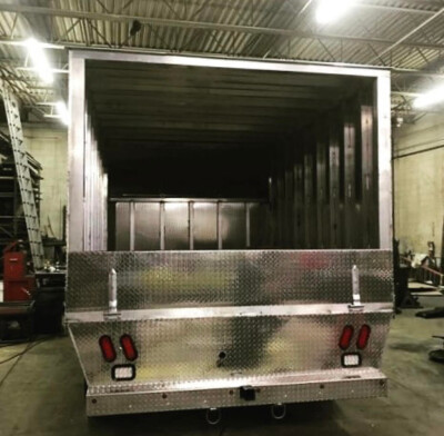 This aluminum truck body was custom fabricated for a local feed company