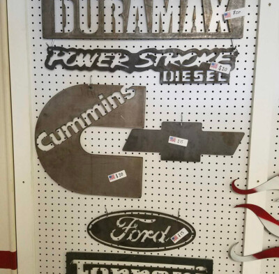 Come in any time and check out our metal sign wall!